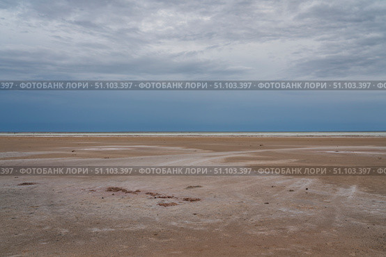 Sandy shores of the drying salt lake Baskunchak on a summer day, Nizhny Baskunchak, Akhtubinsky district, Astrakhan region, Russia. Стоковое фото, фотограф Ula Ulachka / Фотобанк Лори