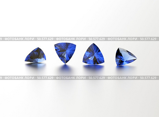 Sapphire. Different shape gemstone on  white. Jewelry background. Стоковое фото, агентство Ingram Publishing / Фотобанк Лори
