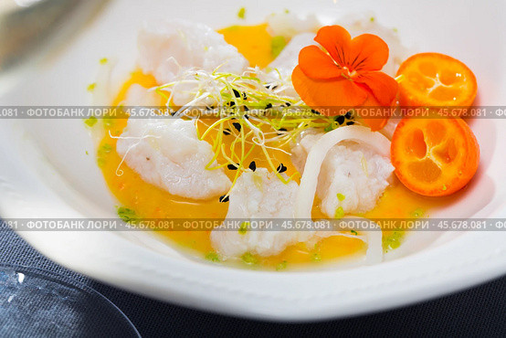 Seafood ceviche from horse-mackerel with spicy avocado sauce, greens and cumquat. Стоковое фото, фотограф Яков Филимонов / Фотобанк Лори