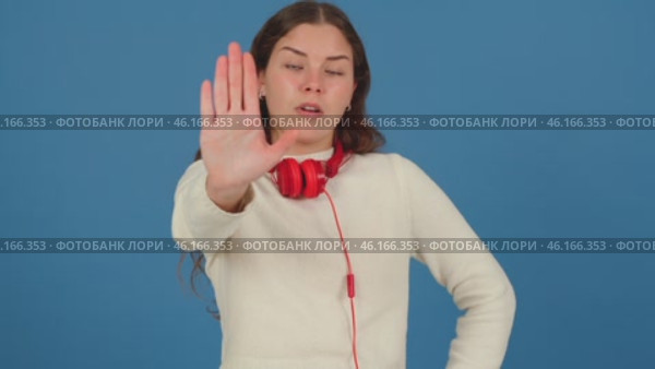 Serious Young Woman Making Stop Gesture with Hand. Стоковое видео, видеограф Raquel Corcoles Mendez / Фотобанк Лори