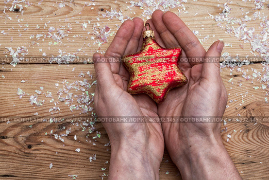 set foto Christmas toys in the human handprints. Стоковое фото, агентство Ingram Publishing / Фотобанк Лори