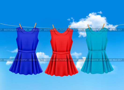 Set of colored dresses hanging on a clothesline on a sunny day. Vector illustration . Стоковая иллюстрация, агентство Ingram Publishing / Фотобанк Лори