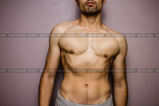 Shirtless athletic young man. Стоковое фото, агентство Ingram Publishing / Фотобанк Лори