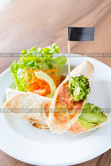 Smoke Salmon Wrap Maxican cuisine. Стоковое фото, агентство Ingram Publishing / Фотобанк Лори