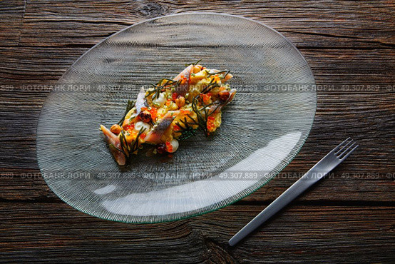 Smoked sardines salad with creamy cheese corn codium and hazelnuts. Стоковое фото, агентство Ingram Publishing / Фотобанк Лори