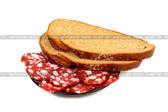Smoked sausage and bread on a white background. Стоковое фото, фотограф Artem Sobov / Фотобанк Лори