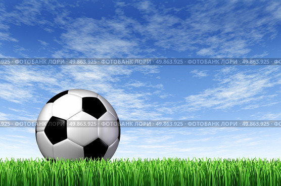 Soccer Ball and grass field background with a blue sky and green european football stadium turf as a concept of fun summer team  leisure sport for players who like to kick a sphere and score a goal in a net. Стоковое фото, агентство Ingram Publishing / Фотобанк Лори