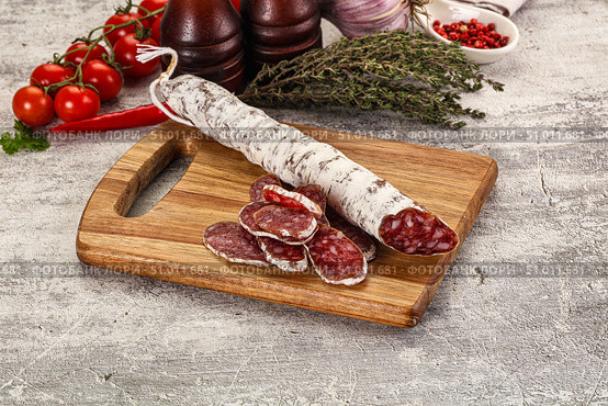Spanish dry Fuet sausages snack. Стоковое фото, фотограф Андрей Старостин / Фотобанк Лори