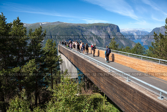 Spectacular Stegastein viewing platform above Aurlandsfjord. It is located on national tourist route Aurlandsfjellet. Norway (2018 год). Редакционное фото, фотограф Кекяляйнен Андрей / Фотобанк Лори