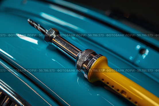 Spot welding tool resting on restored classic car body panel. Стоковое AI-изображение, AI-художник Иван Рябоконь / Фотобанк Лори