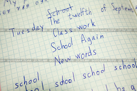 Squared notebook with children class work, handwritten text. Стоковое фото, фотограф Кекяляйнен Андрей / Фотобанк Лори