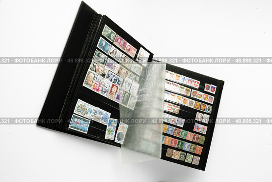 Stamp album. Стоковое фото, агентство Ingram Publishing / Фотобанк Лори