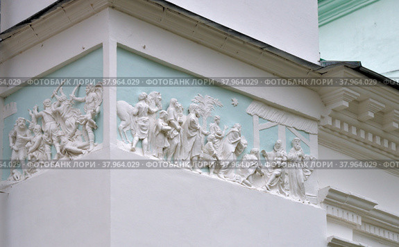 Stucco molding Scenes "Beating babies of Bethlehem" and "Adoration of the Magi". Fragments frieze of western and south façade of Demetrius Cathedral of Spaso-Yakovlevsky Monastery (1801), Monastery of St. Jacob Saviour, it was founded in 1389 century. Rostov, Yaroslavl Region, Russia (2018 год). Редакционное фото, фотограф Алексей Антипов / Фотобанк Лори