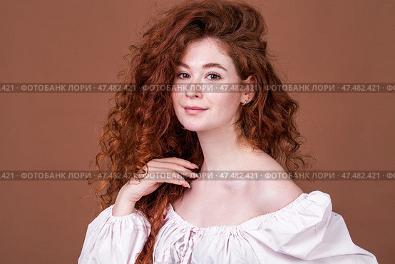 Studio portrait of a red-haired girl. Стоковое фото, фотограф Андрей Аркуша / Фотобанк Лори