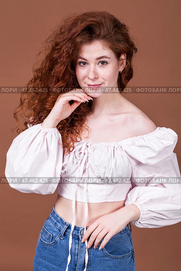Studio portrait of a red-haired girl. Стоковое фото, фотограф Андрей Аркуша / Фотобанк Лори