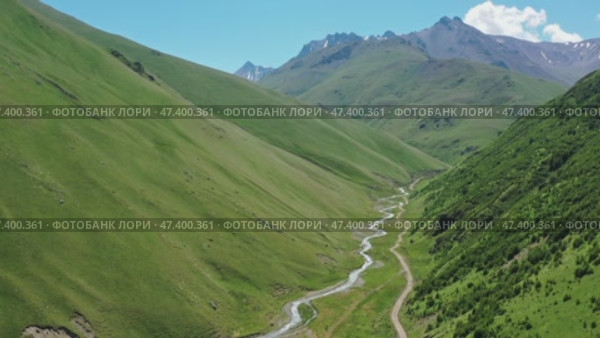 Summer landscape in Caucasus Mountains. Стоковое видео, видеограф Михаил Коханчиков / Фотобанк Лори