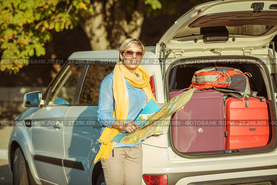 Summer trip by car and suitcase in car trunk. Стоковое фото, фотограф Наталья Давыдова / Фотобанк Лори