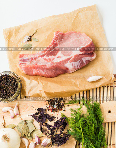 Свиное мясо. Стейк рибай. Свежая сырая свинина со специями. Meat. Fresh raw pork and spices. Ribeye Steak. Стоковое фото, фотограф AllNikArt / Фотобанк Лори