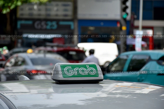 Такси аггрегатора Граб или Grab в Хошимине (Азия) Редакционное фото, фотограф Сергей Митрофанов / Фотобанк Лори