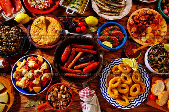 Tapas from spain varied mix of most popular tapa mediterranean food. Стоковое фото, агентство Ingram Publishing / Фотобанк Лори
