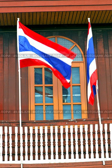temple   in  bangkok thailand incision red venetian blind and terrace waving flag . Стоковое фото, агентство Ingram Publishing / Фотобанк Лори