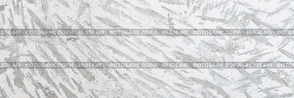 Texture of old concrete wall. Rough gray surface of concrete with a chaotic pattern of potholes and scratches. Perfect for background and design. Close-up. High resolution. Стоковое фото, фотограф Андрей Степанов / Фотобанк Лори