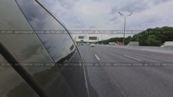The car is moving along the MKAD. Shooting from behind. Russia. Moscow. 13.06.25. Редакционное видео, видеограф Ярославский Максим / Фотобанк Лори
