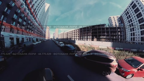 The city is 360 degrees away. Ultra-wide angle. Video distortion. Panorama of a high-rise residential area. Blue sky without clouds. The time interval. Стоковое видео, видеограф Ярославский Максим / Фотобанк Лори