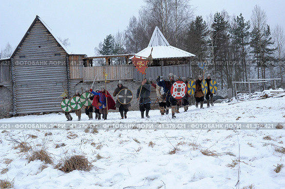 The festival is a historical reconstruction of the Viking Age in winter. Vikings attack with shields and helmets (2014 год). Редакционное фото, фотограф Анна Кривицкая / Фотобанк Лори