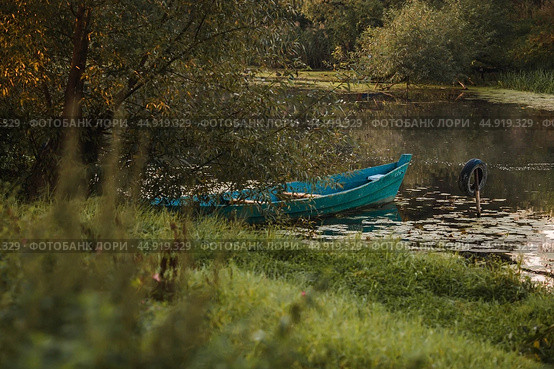 The Golden Ring of Russia, the city of Pereslavl-Zalessky. Fishing boats on the Trubezh River at dawn. Стоковое фото, фотограф Photojuli / Фотобанк Лори