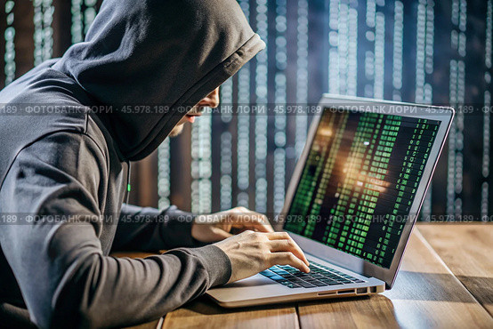 The hacker is working on a laptop, digital codes on a virtual background. Hacking and protecting online data. Digital technologies, software development. Стоковое AI-изображение, AI-художник Photojuli / Фотобанк Лори