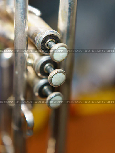 The silver trumpet pipe valves on the defocused background. Musical instrument photography. Стоковое фото, фотограф YuryKara / Фотобанк Лори
