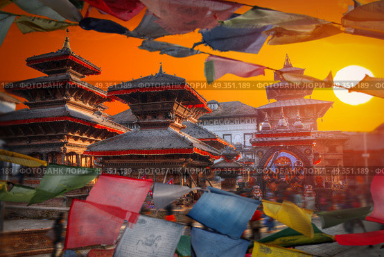 Tibetan flags. Ancient city in Kathmandu Valley. Nepal. Tibetan flags. Patan. Стоковое фото, агентство Ingram Publishing / Фотобанк Лори