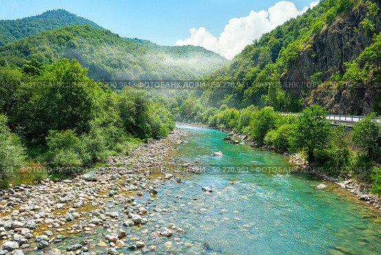 Top view of the mountains and the Tara river. Mountains and the Tara river. Стоковое фото, агентство Ingram Publishing / Фотобанк Лори