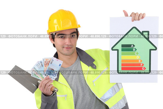Tradesman holding up money. Стоковое фото, агентство Ingram Publishing / Фотобанк Лори