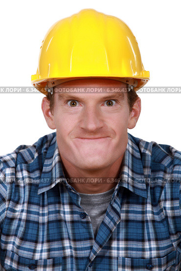 Tradesman making a face. Стоковое фото, фотограф Phovoir Images / Фотобанк Лори