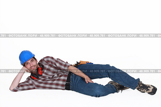 Tradesman on the ground. Стоковое фото, агентство Ingram Publishing / Фотобанк Лори