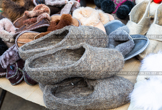 Traditional russian felted slippers of different design. Стоковое фото, фотограф FotograFF / Фотобанк Лори