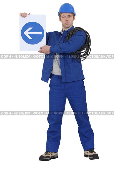 Traffic guard directing traffic. Стоковое фото, агентство Ingram Publishing / Фотобанк Лори