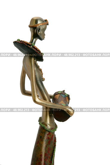 Tribal figurine holding drum. Стоковое фото, агентство Ingram Publishing / Фотобанк Лори