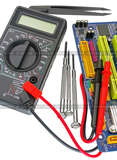 Цифровой мультиметр на белом фоне. Digital  multimeter on a white background. Стоковое фото, фотограф Татьяна Д / Фотобанк Лори