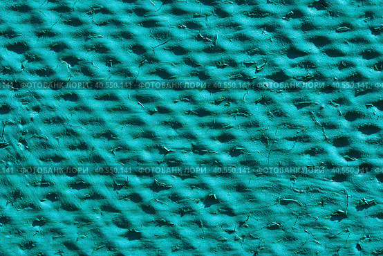 Uneven relief surface of green color with cracked paint. Abstract texture background. Close-up of a relief flat slate painted with green paint. Turquoise relief background. Стоковое фото, фотограф Александр Кротков / Фотобанк Лори