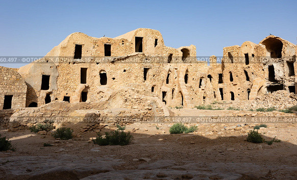 Uninhabited fortified village with houses and granaries, Tunisia. Ksar of Mgabla, Berber, Tataouine. Стоковое фото, фотограф Яков Филимонов / Фотобанк Лори