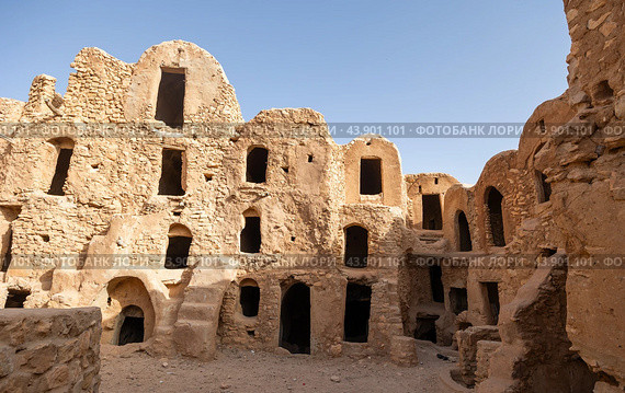 Uninhabited fortified village with houses and granaries, Tunisia. Ksar of Mgabla, Berber, Tataouine. Стоковое фото, фотограф Яков Филимонов / Фотобанк Лори