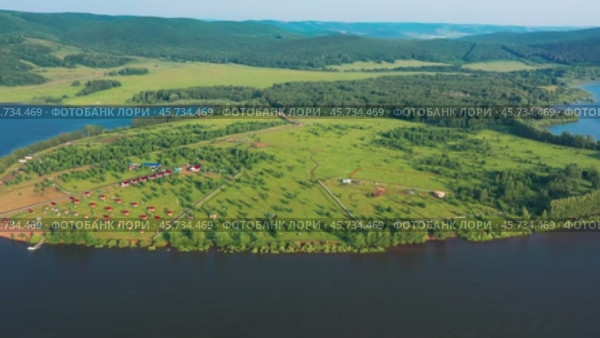 Южный Урал, Башкортостан, Нугушское водохранилище летом. Вид с воздуха. Southern Urals, Bashkortostan, Nugush reservoir in summer. Aerial view. Стоковое видео, видеограф Евгений Романов / Фотобанк Лори