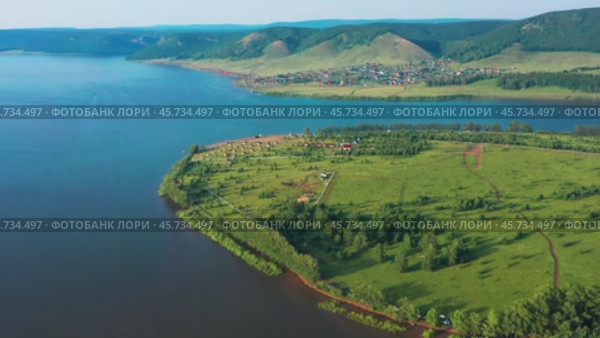Южный Урал, Башкортостан, Нугушское водохранилище летом. Вид с воздуха. Southern Urals, Bashkortostan, Nugush reservoir in summer. Aerial view. Стоковое видео, видеограф Евгений Романов / Фотобанк Лори