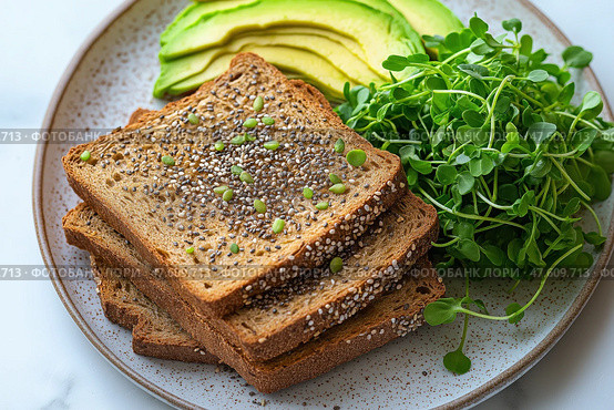 Versatile top view of a stack of thinly sliced whole grain bread next to fresh avocado and microgreens. Универсальный вид сверху на стопку тонко нарезанного цельнозернового хлеба рядом со свежим авокадо и микрозеленью. Стоковое AI-изображение, AI-художник Katsiaryna Repich / Фотобанк Лори