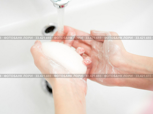 Washing of female hands with soap in bathroom. Стоковое фото, фотограф Оксана Кузьмина / Фотобанк Лори