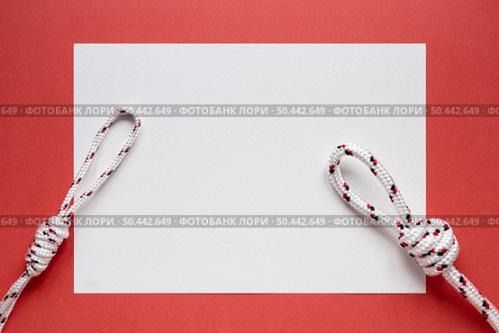 white nautical rope knots copy space paper. Стоковое фото, агентство Ingram Publishing / Фотобанк Лори
