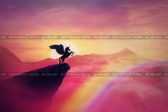 Wild pegasus silhouette on a cliff edge against a pink paradise sunset. Magical background, surreal creature as unicorn with wings, over the rainbow. Freedom and adventure concept, secret dreamland. Стоковое фото, агентство Ingram Publishing / Фотобанк Лори